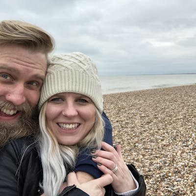 Bow and Arrow UK standing on the beach | Cheerfully Given